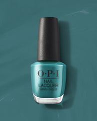Baby Tee-l OPI nail polish bottle standing upright, showcasing a glossy teal nail lacquer shade against a matching teal background, highlighting the classic OPI Nail Lacquer packaging for US beauty shoppers.