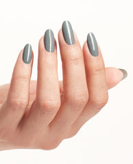Hand with long oval nails painted in Suzi Talks with Her Hands, a glossy gray OPI nail polish nail lacquer, held against a clean white background to showcase the smooth, even manicure color and shine.